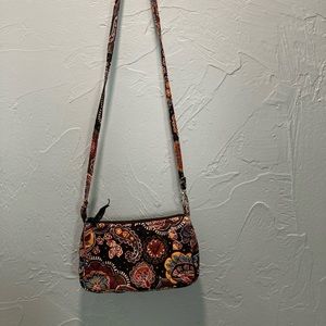 Vera Bradley 
Small pocket book
Black/brown